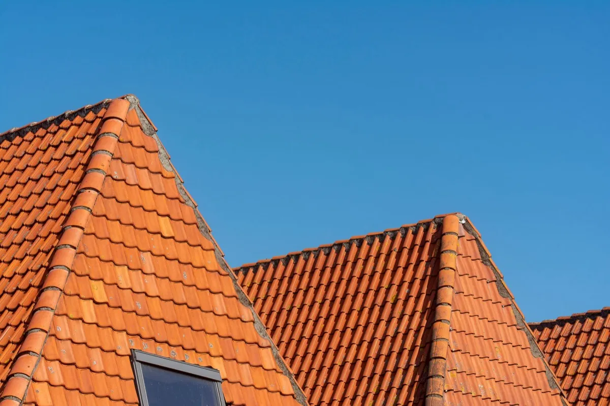 Clay barrel tile rooflines on homes in Stamford, CT