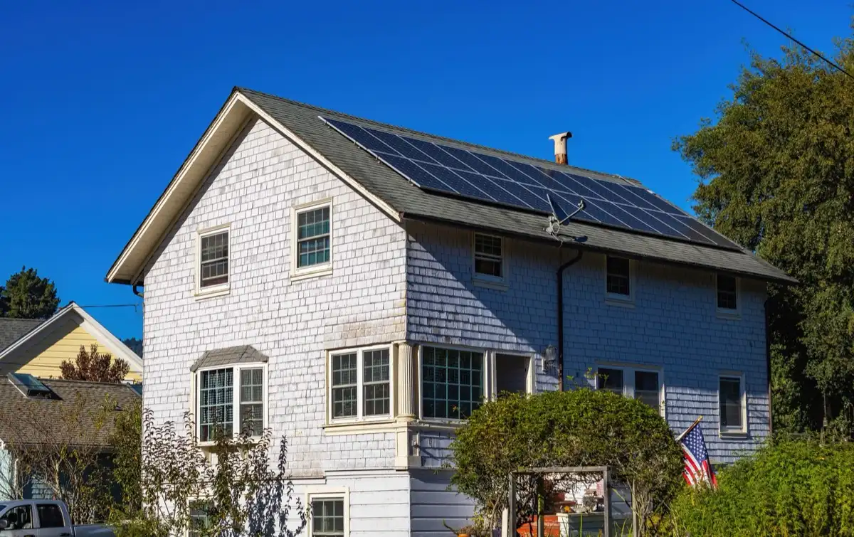 Shingle roof on a house in Stamford, CT, where a leak claim turns on whether the roof was broken or simply worn out